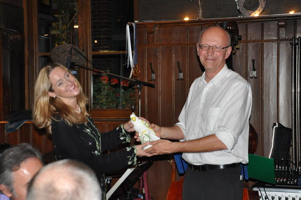 Prof Schlemmer hands over the ICIS presidency, and Imogen the parrot to Prof. Rockall